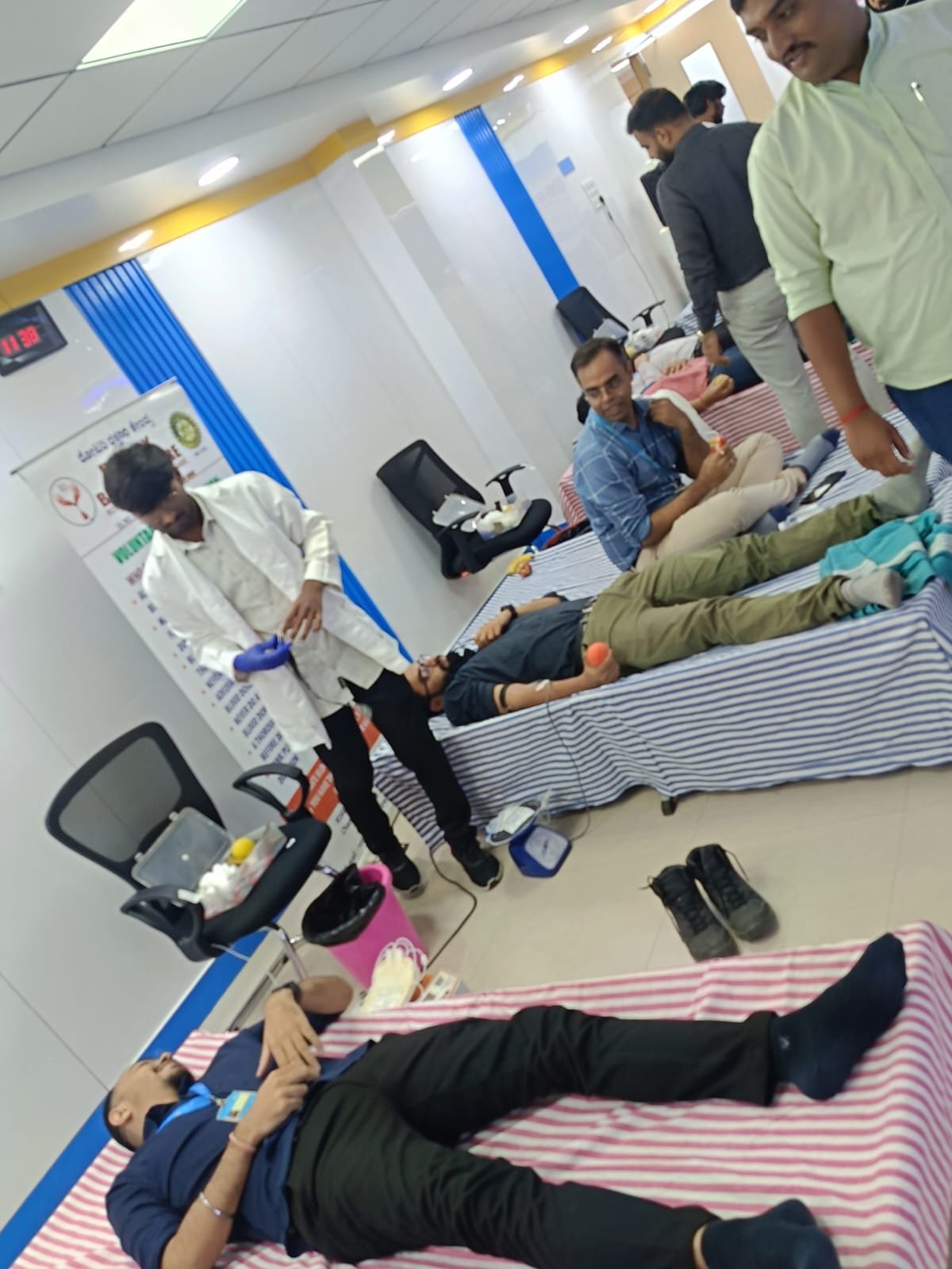 A donor participating in a voluntary blood drive