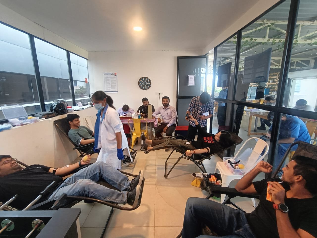 Donors taking part in a workplace blood drive